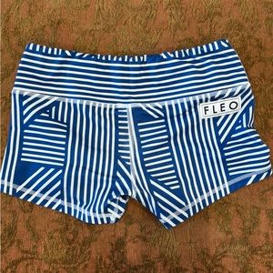 white and blue Fleo workout shorts. Size small.